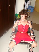 red dressed housewife tied to chair