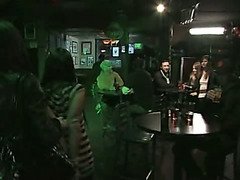 Girl struggles in bondage at a nightclub
