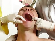 Two nurses doing merciless milking