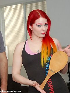 <!–-IMAGE_COUNT-–> of The sharp CRACK of a wooden paddle spanking Alison Miller’s bare bottom