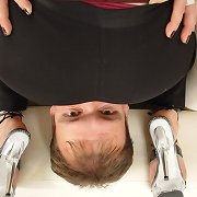Dominatrix on man\'s face