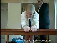 Pigtailed Schoolgirl Takes the Belt Across the Ass