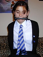 A Schoolgirl is horsegagged and bound